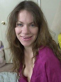 Filthy mom strips naked and plays with pussy